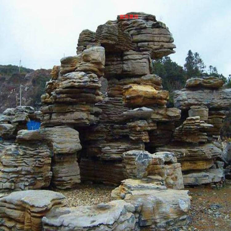 IM电竞河南千层石假山雷苒景观 南阳塑石假山施工